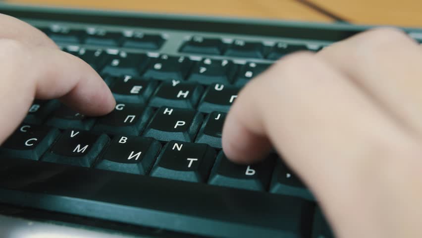 A man typing on a computer keyboard | Shutterstock HD Video #22214251