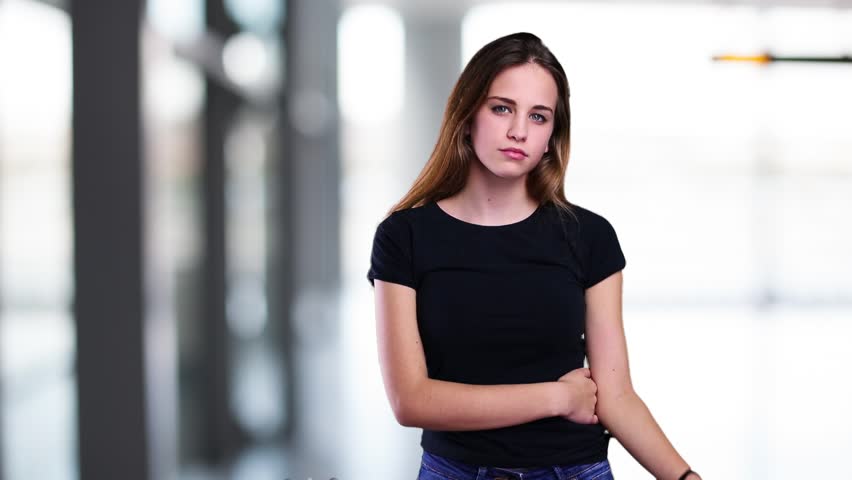 young woman drinking a soda