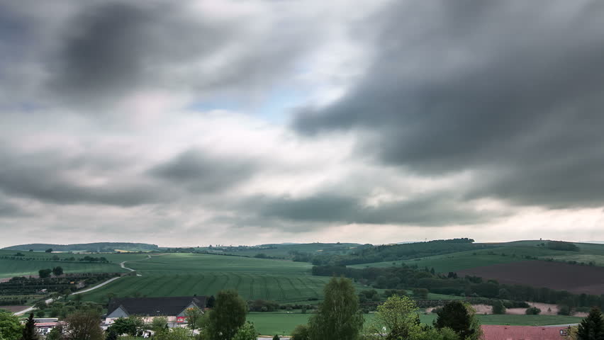 Clouds over hills time lapse