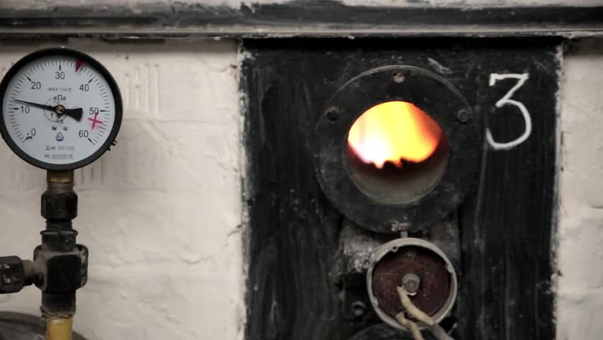 Boiler room with pipes, valves and sensors