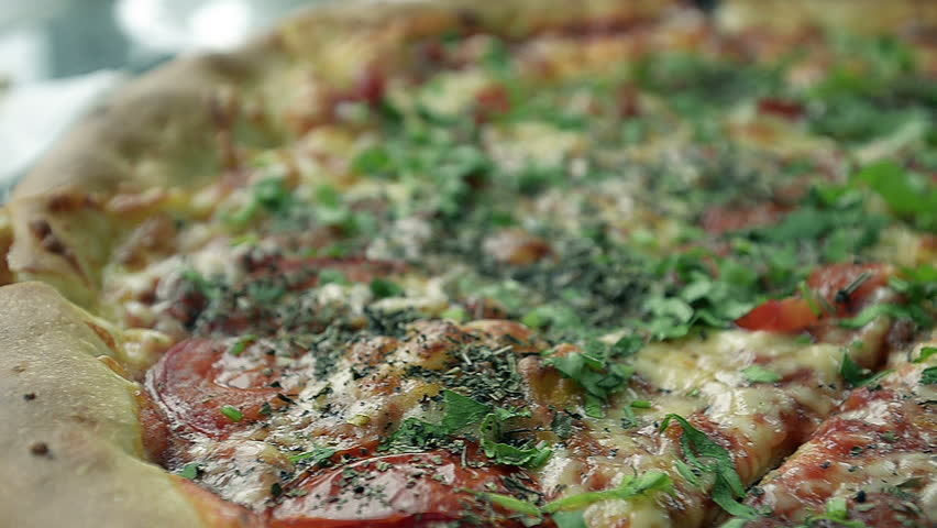 Close Up Abstract a Big Juicy Pizza in a Restaurant Top View