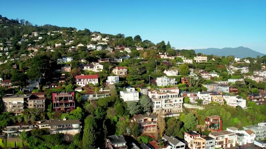 Aerial view of San Francisco hillside houses by ocean 6