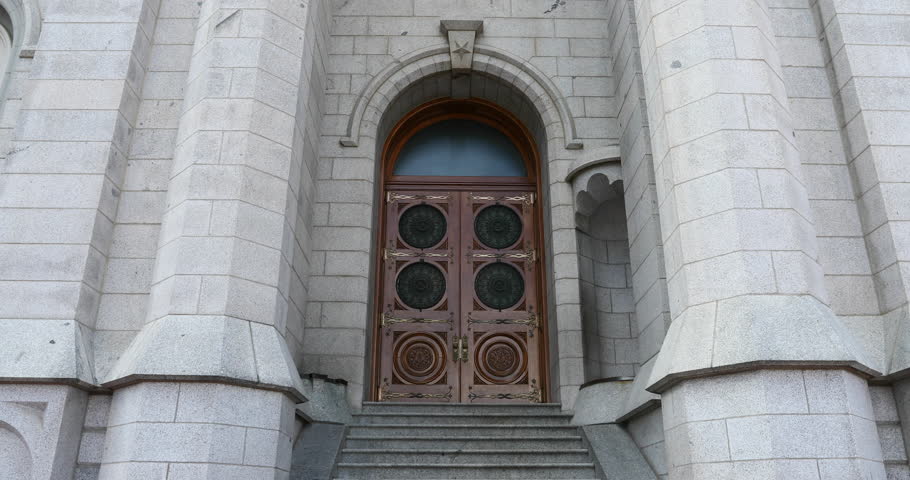 SALT LAKE CITY, UTAH - DEC 2016:  Temple door husband wife steps.