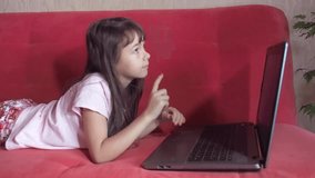Little girl with a laptop