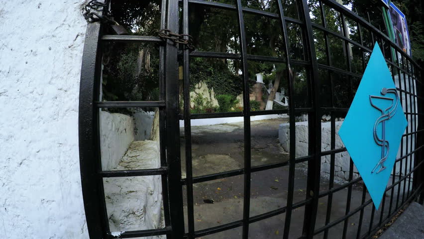 Dynamic view of iron gates hospital with symbol medicine