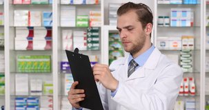 Young Pharmacist Specialist American Writing on Clipboard in Pharmaceutical Shop. Ultra High Definition, UltraHD, Ultra HD, UHD, 4K, 2160P, 4096x2160