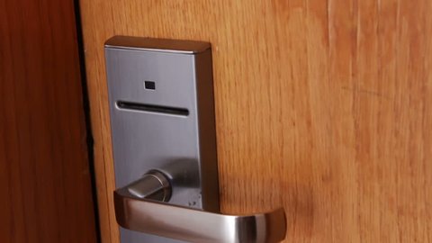 woman opens the door with the key card