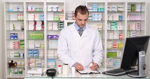 Young Pharmacist Specialist American Man Making a List of Drug Medicine Pharmacy. Ultra High Definition, UltraHD, Ultra HD, UHD, 4K, 2160P, 4096x2160