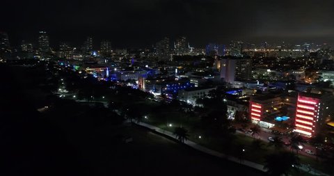 MIAMI BEACH - DECEMBER 12: Night aerial video of Miami Beach Ocean Drive which is a popular tourist destination on the beach December 12, 2016 in Miami Beach FL, USA