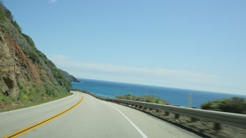 Vehicle point-of-view driving on California Highway 1 (aka Cabrillo Highway or Pacific Coast Highway) in the Big Sur area of Central California.