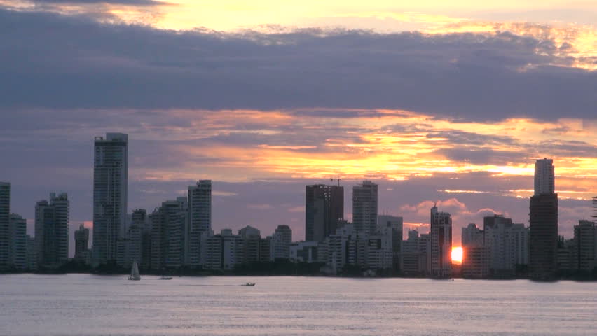 Shoreline of Playa de Boca Grande in Cartagena, Colombia. High-rises, hotels and apartments can be seen along the coast - Skyscrapers by night, a Business & Finance Video by Ion Mes