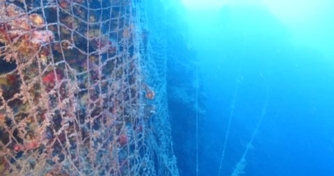 ghost hunting fish net so big underwater fisherman waste pollution driftnets