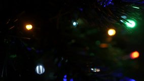 Sequence of fairy lights on garland 4K 2160p 30fps UHD footage - Lot of Christmas tree colorful bulbs blinking in the dark 3840X2160 UltraHD video