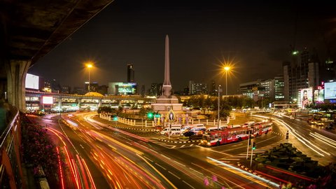 BANGKOK - 26 august:hypertimelapse view of the Monorail, Pedestrian bridges and Traffic at Victory Monument, one of the city's main traffic hubs at dusk on 19 November 2015 in Bangkok, Thailand 
