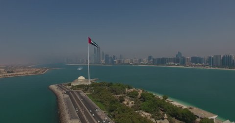 Abu Dhabi UAE Flag approaching by drone