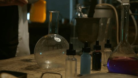 Strange scientist prepares a potion