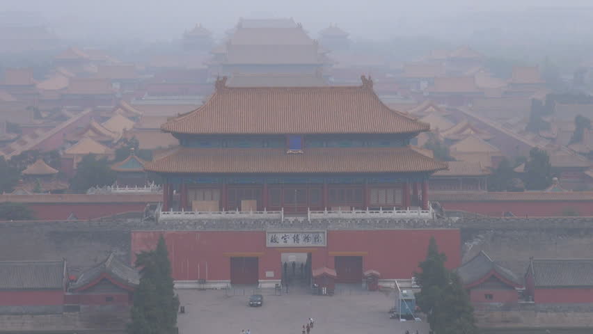 Aerial view of heavy fog at Forbidden City museum, Chinese monument in Beijing 