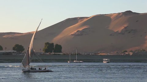 Feluccas Sailing On River Nile; Aswan Egypt