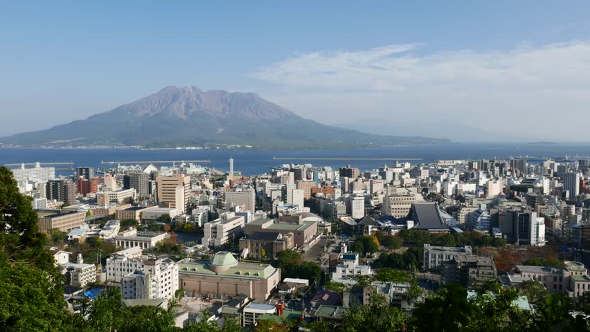 Time lapse of Japan city skyline with Sakurajima Volcano