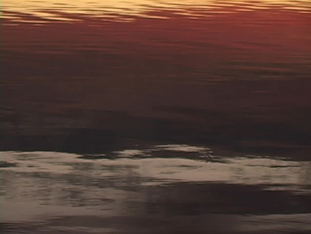 Abstract view of river water at sunset