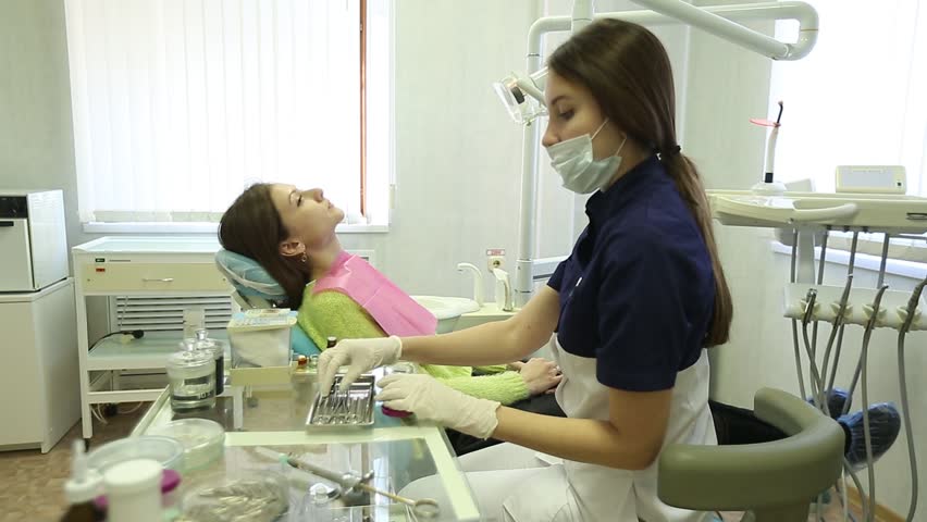 Close-up of a teeth treatment at the dentistry | Shutterstock HD Video #22415479