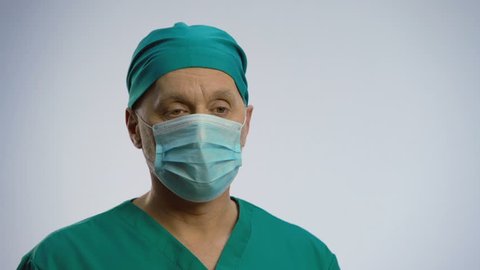 Doctor In Face Mask Nodding Stock Footage Video 100 Royalty-free 22426183 Shutterstock Doctor In Face Mask Nodding Stock Footage Video 100 Royalty-free 22426183 Shutterstock