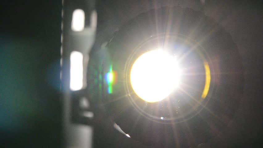 Film projector close up, projector lens and light Royalty-Free Stock Footage #2243440