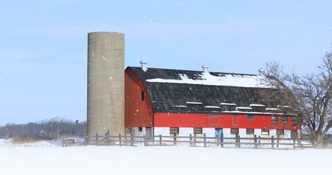 4K UltraHD Red barn in a winter landscape
