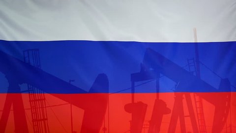 Concept oil production in Russia oil pumps and russian flag in slow motion movement