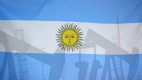 Concept oil production in Argentina oil pumps and argentinean flag in slow motion movement