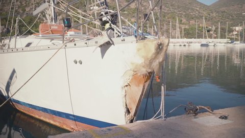 Damaged yacht after crash accident