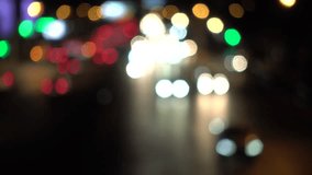 4K Bokeh of car lights. On the street at night Colorful Circles Video Background Loop Glassy circular shapes perform a colorful dance. motion background that is just perfectly suited for DVDs, events