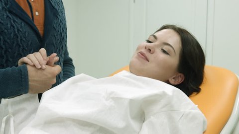 IVF embryo transfer procedure, woman expressions