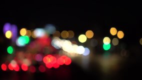 4K Bokeh of car lights. On the street at night Colorful Circles Video Background Loop Glassy circular shapes perform a colorful dance. motion background that is just perfectly suited for DVDs, events