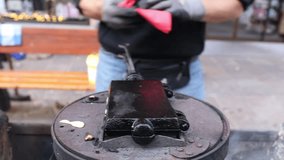 Cooking traditional hot waffles using old fashioned waffle iron charcoal
