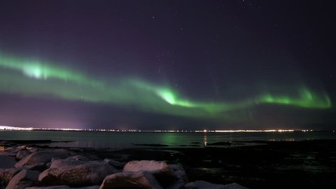 Active Northern Lights over Reykjavik, Iceland