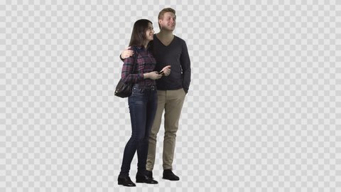 Handsome blonde male and beautiful girl in plaid shirt are standing together and looking at something. Clip with alpha channel