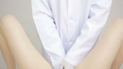 Doctor gynecologist performing an examination