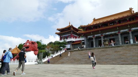 Wenwu Temple exterior with tourists, time lapse