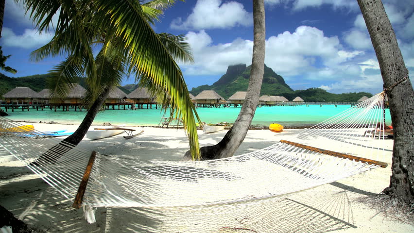 hammock on tropical beach by overwater Stock Footage Video (100% ...