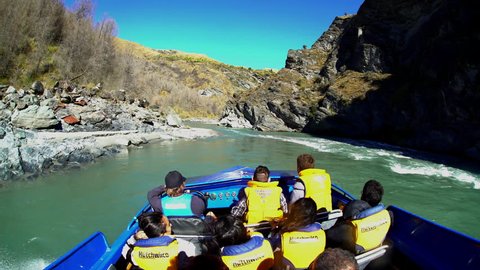 Thrilling adventure ride at speed through canyon on Jet Boat Shotover River Queenstown South Island New Zealand