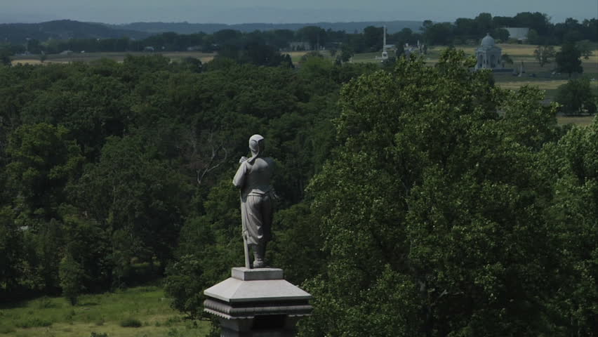 GETTYSBURG, PENNSYLVANIA - JULY 2013 - large-scale, epic Civil War anniversary. Gettysburg Battlefield monuments, memorials, snake rail fences & fields.  National Military Park and historical landmark