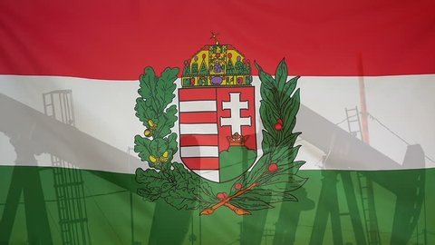 Concept oil production in Hungary coat of arms oil pumps and hungarian flag in slow motion movement