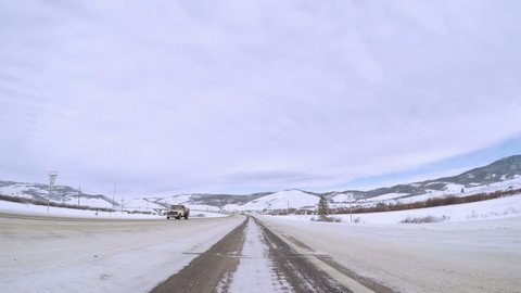 Denver, Colorado, USA-December 8, 2016. POV point of view - Driving highway on Western Slopes in Colorado.