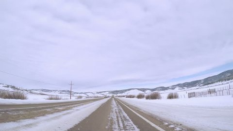 Denver, Colorado, USA-December 8, 2016. Time-lapse. POV point of view - Driving highway on Western Slopes in Colorado.