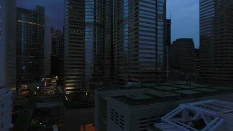 12 of July 2016 Hong Kong. High technology developed district of city located near coastline with skyline and skyscraper illuminating through window crystal exterior, can be used for advertising or film