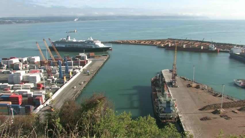 Napier, New Zealand. View over port facility with Cruise ship approaching port