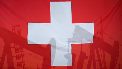 Concept oil production in Switzerland oil pumps and swiss flag in slow motion movement