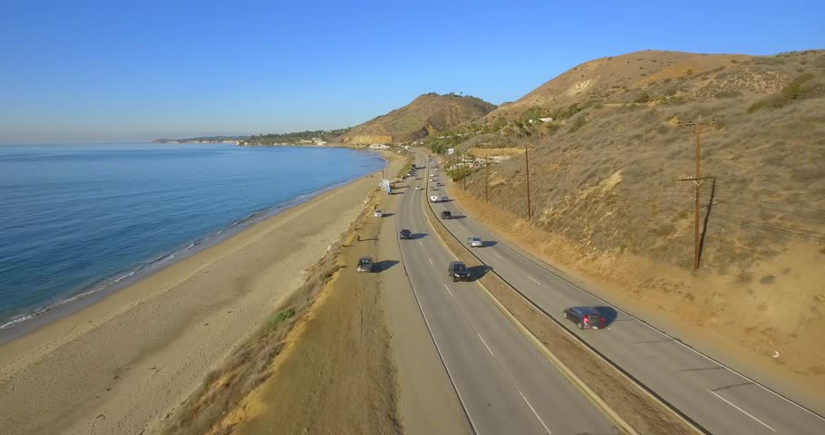 Malibu Freeway / Highway. Aerial shot. Following a car