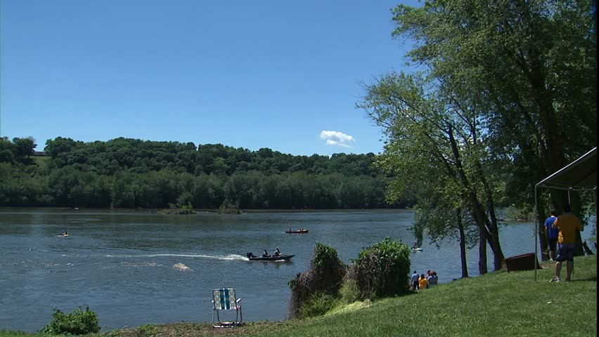Potomac river with water enthusiasts in canoes and kayaks, Washington, D.C.